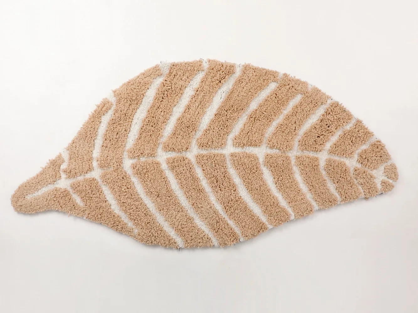 Micro shaggy leaf shape rug, 24x48, lite brown